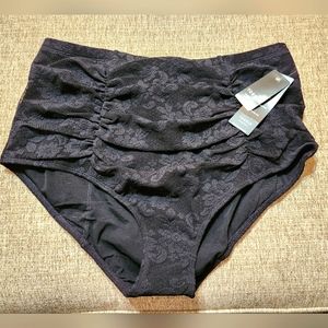 NWT TORRID  SIZE 1 PLUS SIZE Black swimsuit bottom. Black lace with ruched